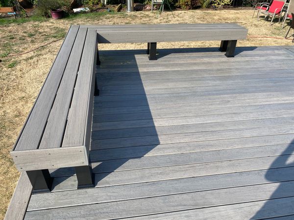 Gray composite deck with built-in bench seating