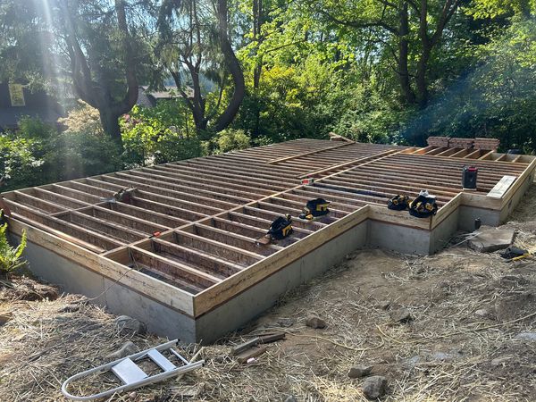 Floor joist framing on a new concrete foundation